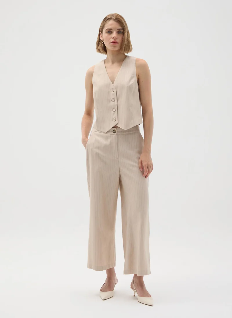 او في اس بنطلون واسع مخطط بيج من أو في إس